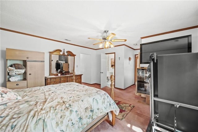 bedroom featuring carpet floors, crown molding, multiple closets, and a ceiling fan