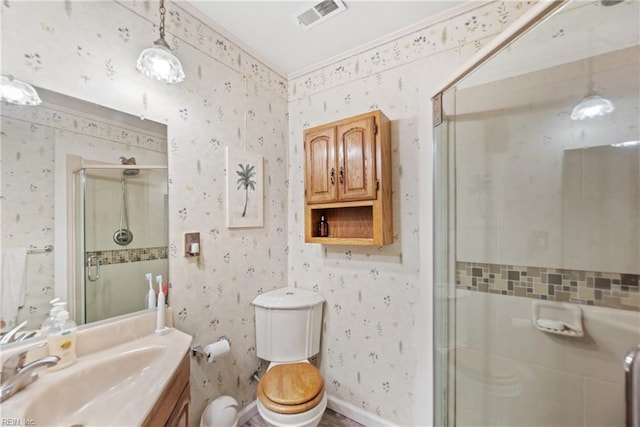 full bath featuring crown molding, visible vents, toilet, a shower stall, and wallpapered walls