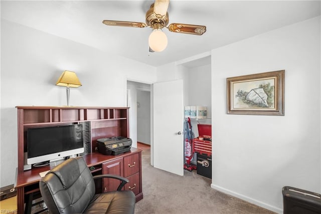 office with carpet floors, baseboards, and a ceiling fan