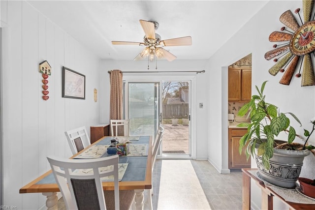 dining space featuring a ceiling fan