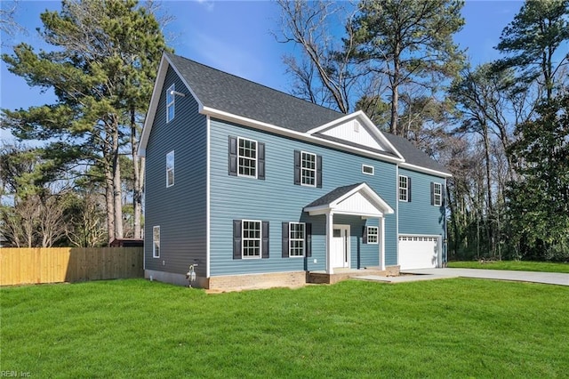 view of front of property with driveway, roof with shingles, an attached garage, fence, and a front lawn