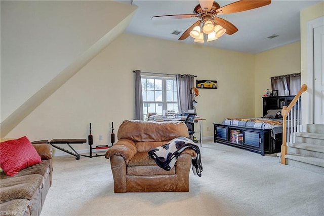 living area with carpet floors, stairway, baseboards, and visible vents