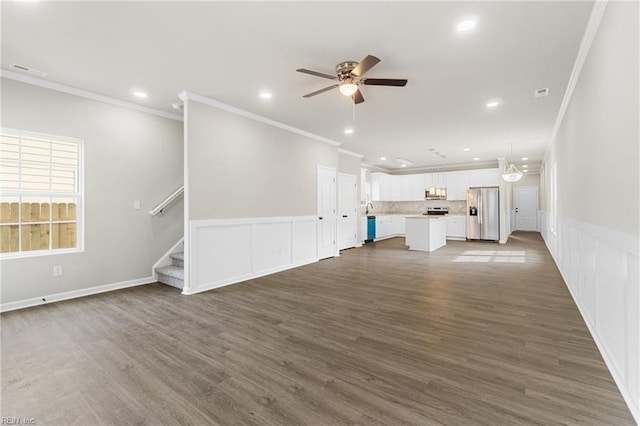 unfurnished living room featuring dark wood-style floors, ceiling fan, stairway, and recessed lighting