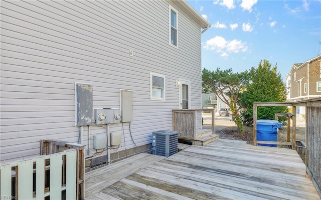 wooden deck with central AC unit