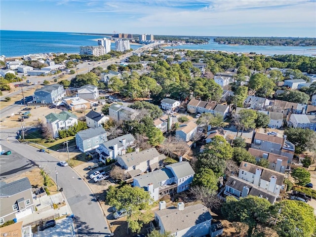 bird's eye view featuring a water view and a residential view