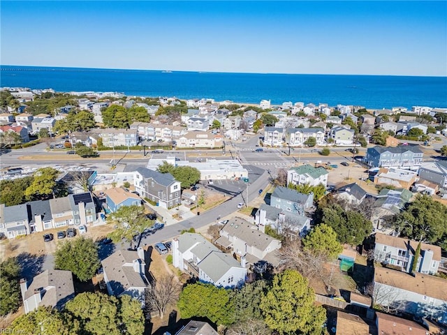 birds eye view of property featuring a water view and a residential view