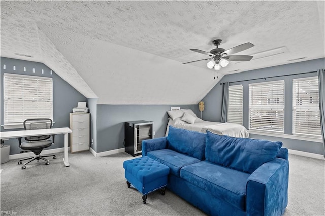 bedroom with lofted ceiling, a ceiling fan, baseboards, and carpet flooring