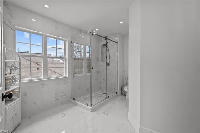 bathroom with toilet, marble finish floor, a marble finish shower, and recessed lighting