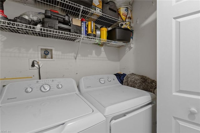 laundry room featuring washer and clothes dryer and laundry area