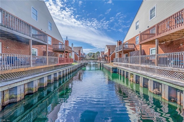 view of community featuring a water view