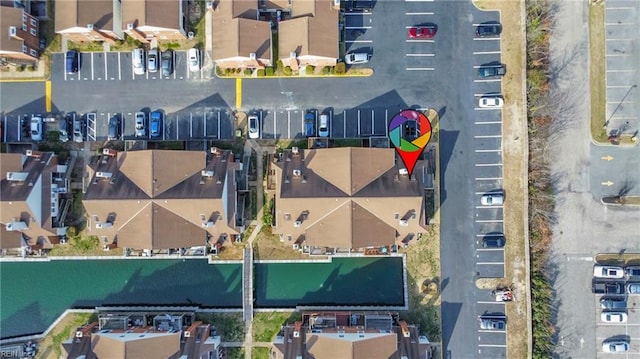 birds eye view of property with a residential view