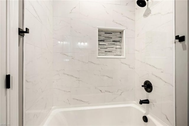 bathroom with shower / bathing tub combination