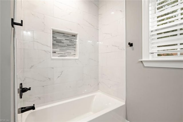full bath featuring washtub / shower combination