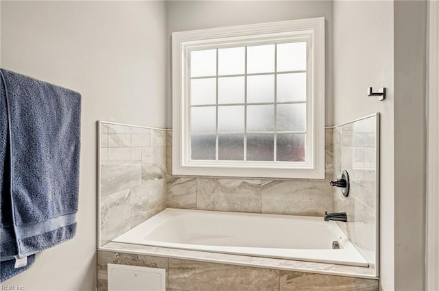 full bathroom with a garden tub
