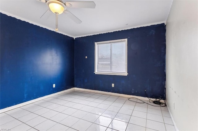 unfurnished room featuring baseboards, a ceiling fan, and tile patterned floors