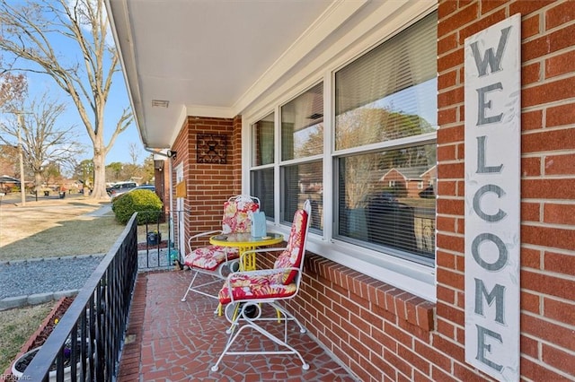 balcony featuring a porch