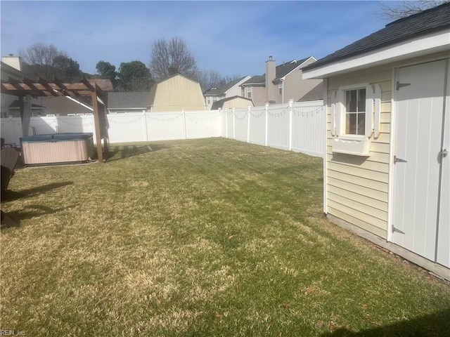 view of yard featuring a fenced backyard, a pergola, and a hot tub