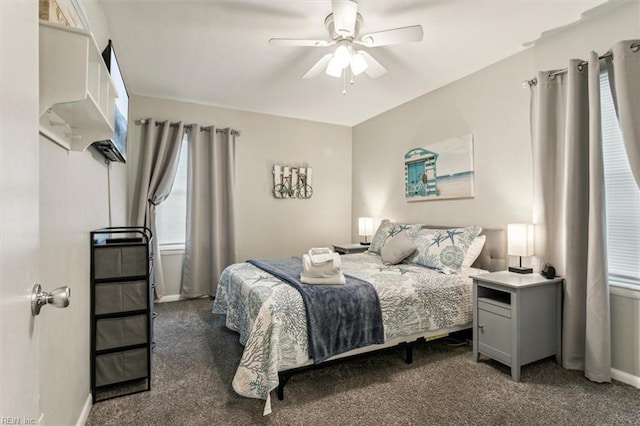 bedroom featuring ceiling fan, baseboards, and carpet flooring