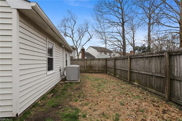 view of yard featuring a fenced backyard and cooling unit