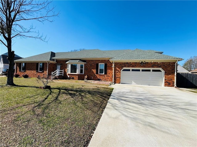 ranch-style house featuring brick siding, crawl space, a front yard, and fence