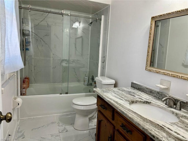 bathroom featuring marble finish floor, vanity, toilet, and bath / shower combo with glass door