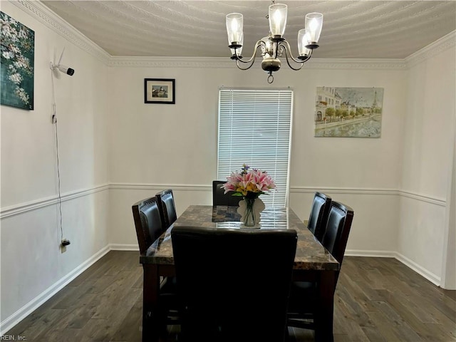 dining area with an inviting chandelier, baseboards, and dark wood-type flooring