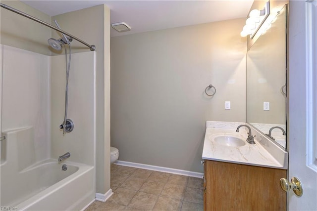 full bathroom with  shower combination, baseboards, vanity, and toilet