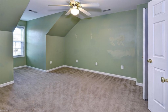 bonus room with lofted ceiling, baseboards, visible vents, and a ceiling fan