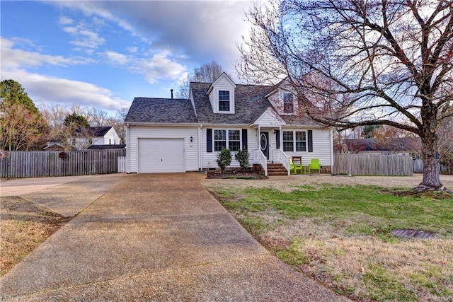 cape cod-style house featuring an attached garage, fence, driveway, roof with shingles, and a front lawn