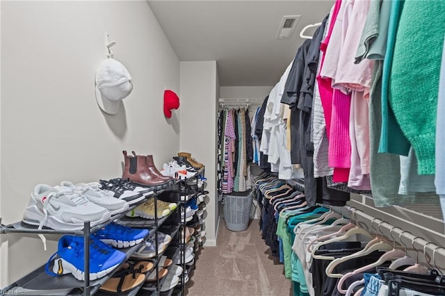 spacious closet with carpet and visible vents