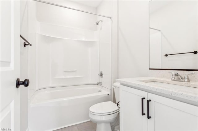 bathroom with shower / bath combination, vanity, and toilet