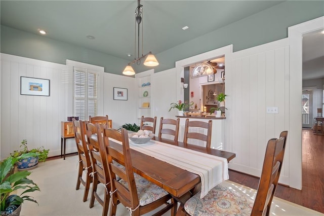 dining space featuring wood finished floors