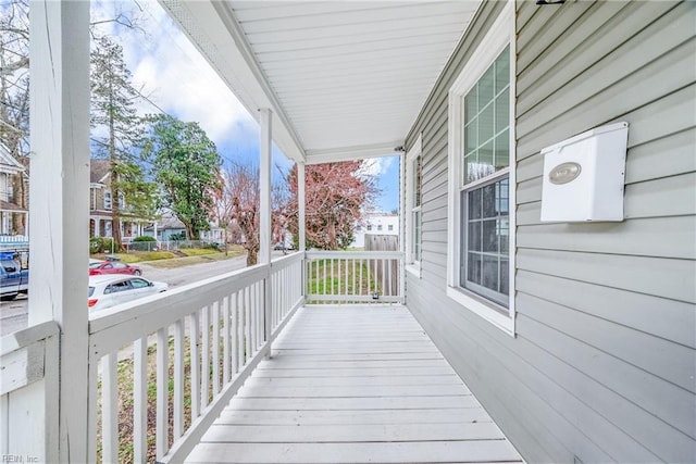 wooden deck featuring covered porch