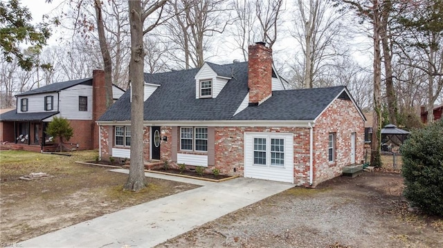 view of front of property with brick siding, roof with shingles, a chimney, and fence