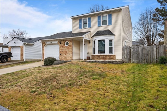 traditional-style home with a garage, brick siding, fence, driveway, and a front lawn