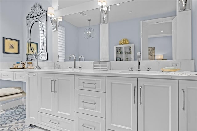 bathroom featuring double vanity and a sink