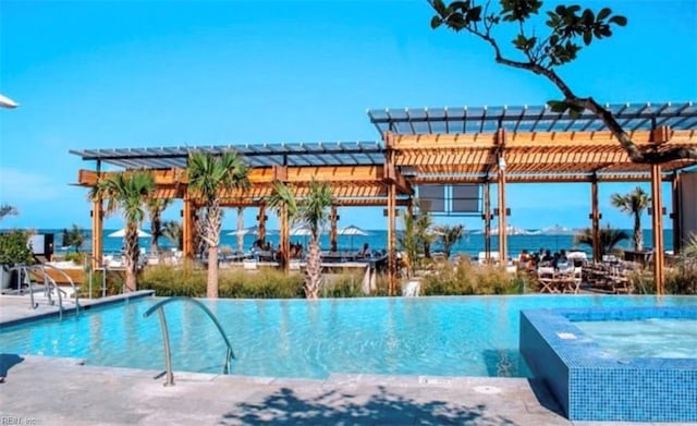 community pool with a pergola