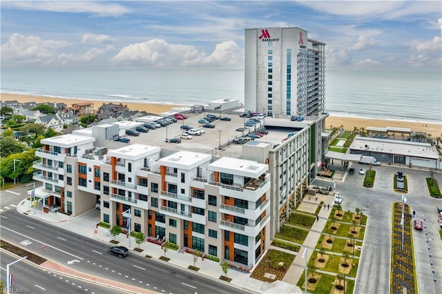 aerial view with a beach view and a water view