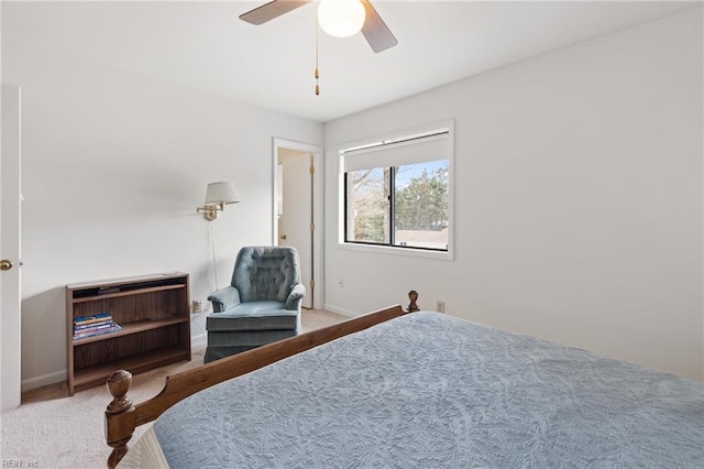 bedroom featuring ceiling fan, carpet flooring, and baseboards