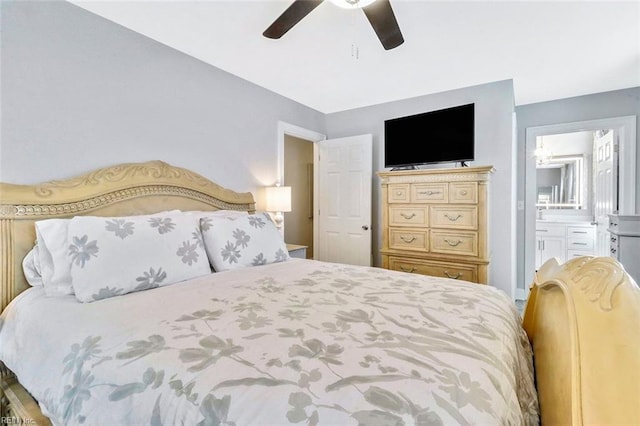 bedroom featuring ensuite bath and a ceiling fan