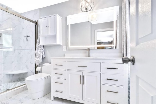 bathroom featuring a marble finish shower, marble finish floor, vanity, and toilet