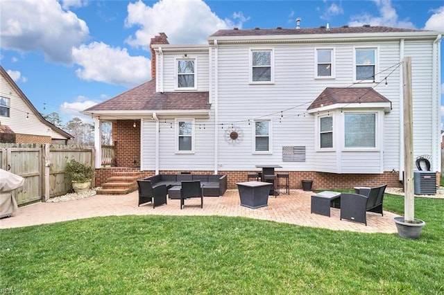 back of house featuring a yard, a patio, fence, cooling unit, and an outdoor living space