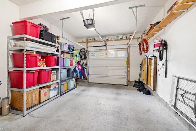 garage featuring a garage door opener