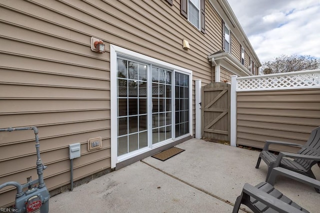 view of patio / terrace featuring a gate