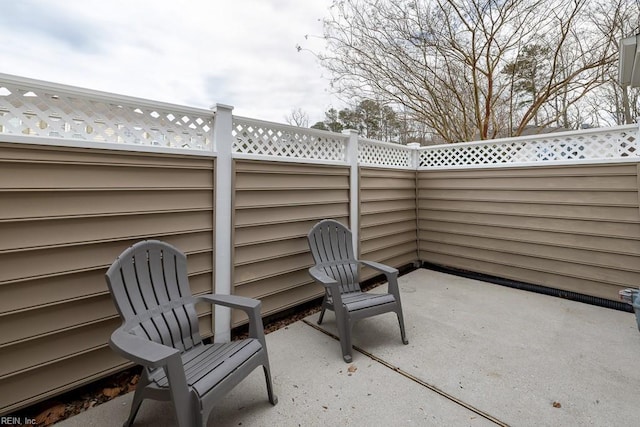 view of patio with fence