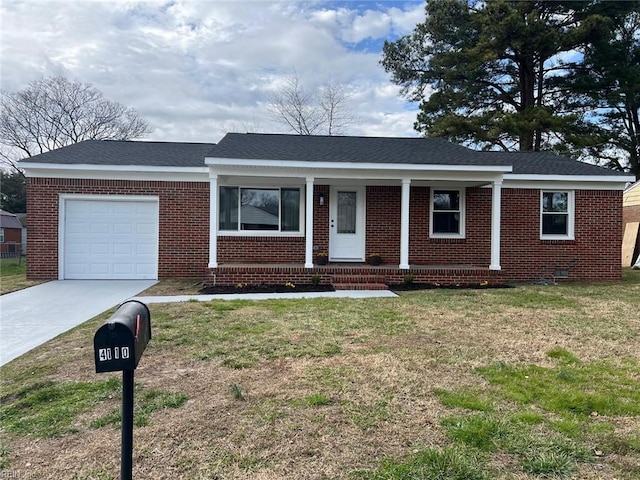 ranch-style house featuring a front lawn, a garage, and brick siding