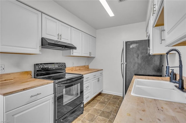 kitchen featuring black range with electric cooktop, a sink, under cabinet range hood, and white cabinetry