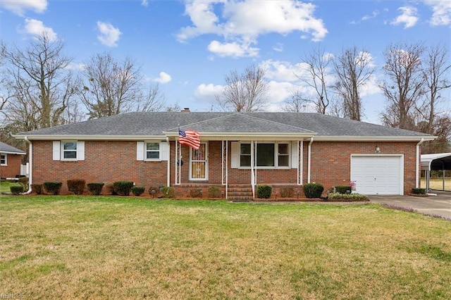 ranch-style home with brick siding, a garage, driveway, and a front yard