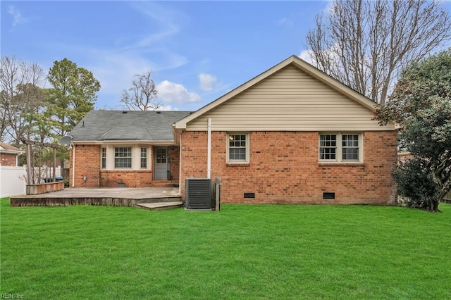 back of house with a deck, central AC, brick siding, a yard, and crawl space