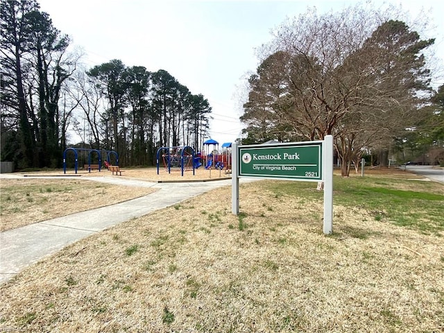 exterior space featuring a lawn and playground community